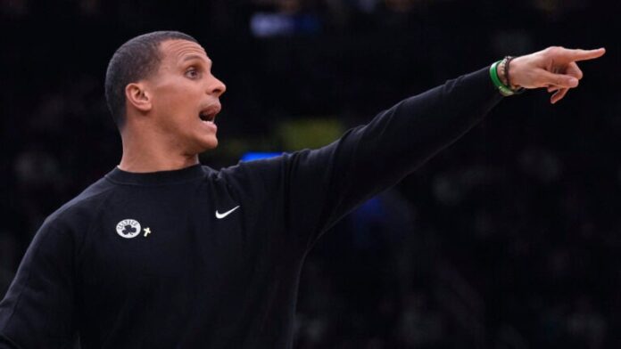 Joe Mazzulla calls to his players during a game against the Pistons.